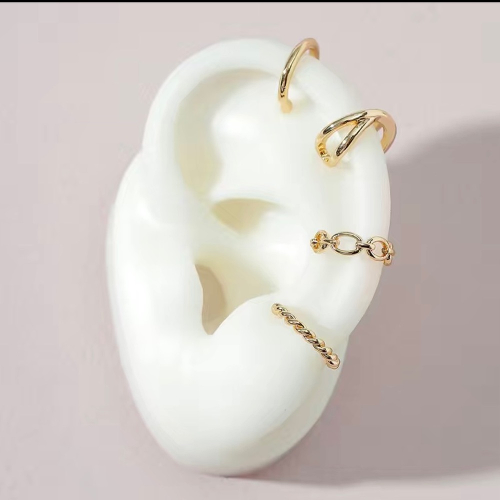 Gold patted ear cuffs NWT